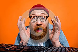 Closeup photo of website developer senior programmer man working late nights code problem stupor near keyboard isolated