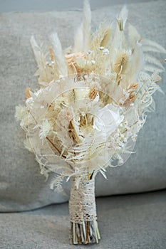 Closeup photo of wedding white rose bouqet