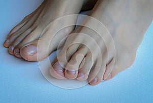 Closeup photo of woman feet and toes