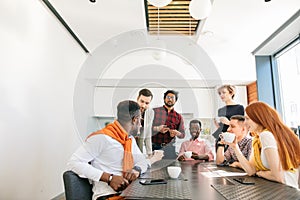 Closeup photo of young business team having conversation in
