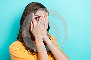 Closeup photo of young funny excited scared woman cover face eyes no vision nervous empty space shopping offer isolated