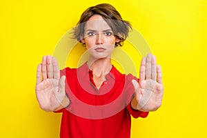 Closeup photo of young funny unhappy serious confident businesswoman wear red shirt showing palms no restriction