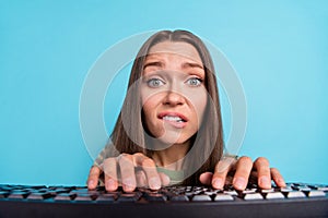 Closeup photo of young pretty amazed nervous girl typing chatting keyboard computer problems deadline programmer