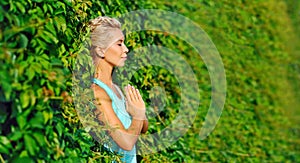 Closeup picture of hands of a meditating woman