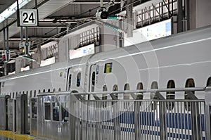 Closeup picture of high speed train parking at the train station