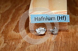 Closeup on a piece of the periodic element No.72 Hafnium