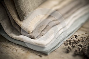 Closeup of a Pile of Folded Dull-Colored Fabric