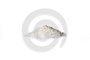 Closeup of a pile of potassium nitrate crystals isolated on a white background