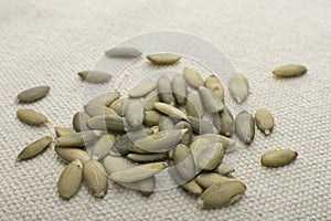 Closeup pile of pumpkin seeds