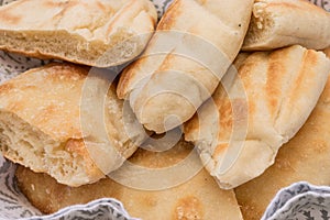 Closeup of Pita-flatbread in cloth basket