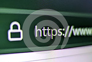 Closeup pixelated view of an internet browser with security lock and https://www text