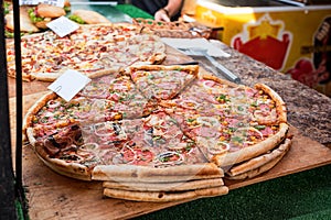 Closeup of pizza in street fast food cafe