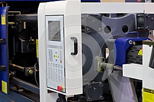 closeup of plastic injection molding press machine