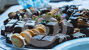 Closeup of a plate of chocolate-covered candies for a banquet