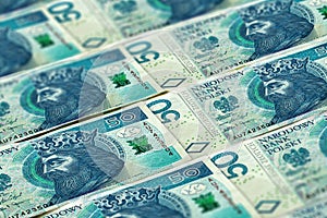 Closeup Polish zloty banknotes background. PLNpattern. 50 zloty
