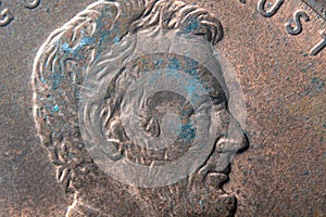 Closeup of the portrait of Abraham Lincoln on metal coin