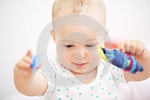 Closeup portrait of adorable child isolated on white background