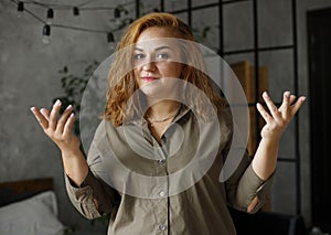 Closeup portrait of angry annoyed woman raising hand up to say no. Negative human emotion facial expression