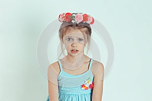 Closeup portrait Angry young Girl about to have Nervous atomic breakdown displeased isolated white wall background. Negative human