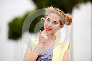 Closeup portrait of attractive blonde girl