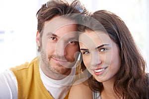 Closeup portrait of attractive couple smiling