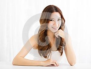 Closeup portrait of attractive young woman smiling