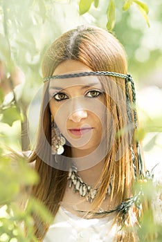 Closeup portrait of beautiful hippie young woman, outdoor.