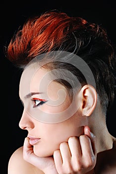 Closeup portrait of beautiful woman with bright make-up and red nails