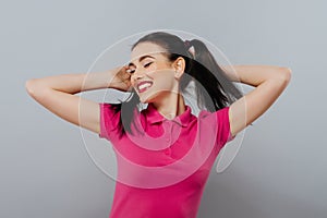 Closeup portrait of a beautiful young woman with carefree expression