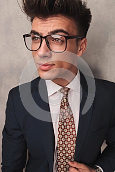 Closeup portrait of a business man looking to side