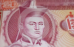 Closeup portrait of communist revolutionary, Father of mongolian revolution Damurrency banknote (in