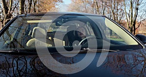 Closeup portrait displeased angry pissed off aggressive woman driving car. Negative human emotions face expression.