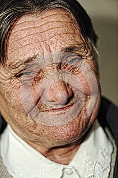 Closeup portrait of elderly happy woman