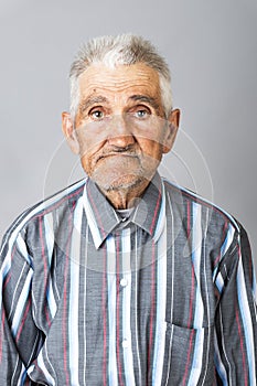 Closeup portrait of expressive old man