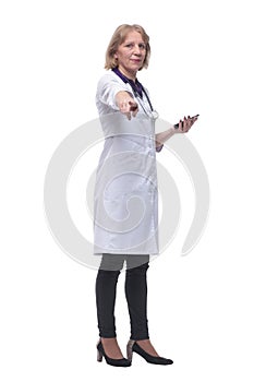 Closeup portrait of female doctor with stethoscope, healthcare professional texting on phone