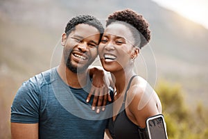 Closeup portrait fit african american couple smiling while exercising outdoors. Young athletic man and woman looking