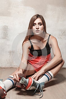 Closeup portrait of fitness woman in quads.