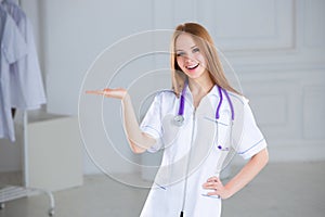 Closeup portrait of friendly, smiling confident female doctor, healthcare professional isolated on white background. Patient visit