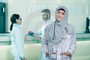 Closeup portrait of friendly, smiling confident muslim female doctor.