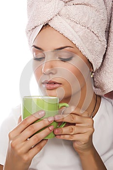 Closeup portrait of girl with cup