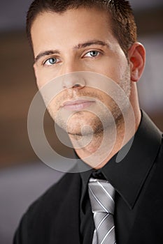 Closeup portrait of goodlooking businessman