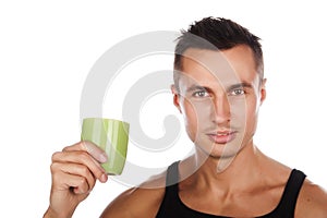 Closeup portrait of guy with cup