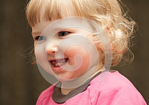 Closeup portrait of happy baby girl