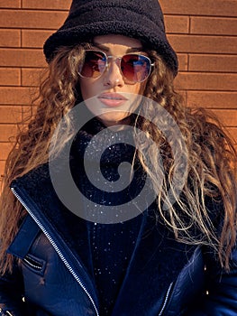 Closeup portrait of happy fashionable lady at winter time