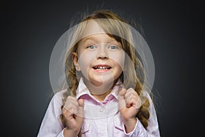 Closeup Portrait happy girl going surprise on gray background