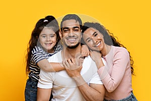 Closeup Portrait Of Happy Middle Eastern Family Of Three With Adorable Daughter