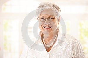 Closeup portrait of happy senior woman