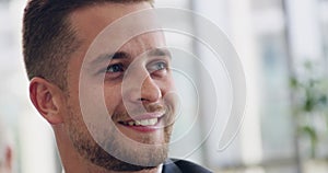 Closeup portrait of a happy, successful and confident business man laughing at joke during a work meeting. An attractive