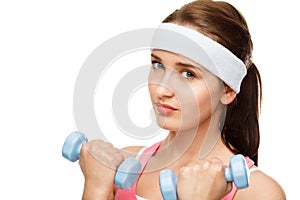 Closeup portrait healthy athletic woman lifting weights