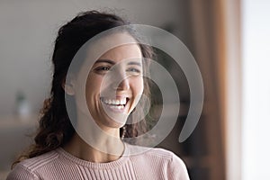 Closeup portrait laughing Latina woman with white toothy smile